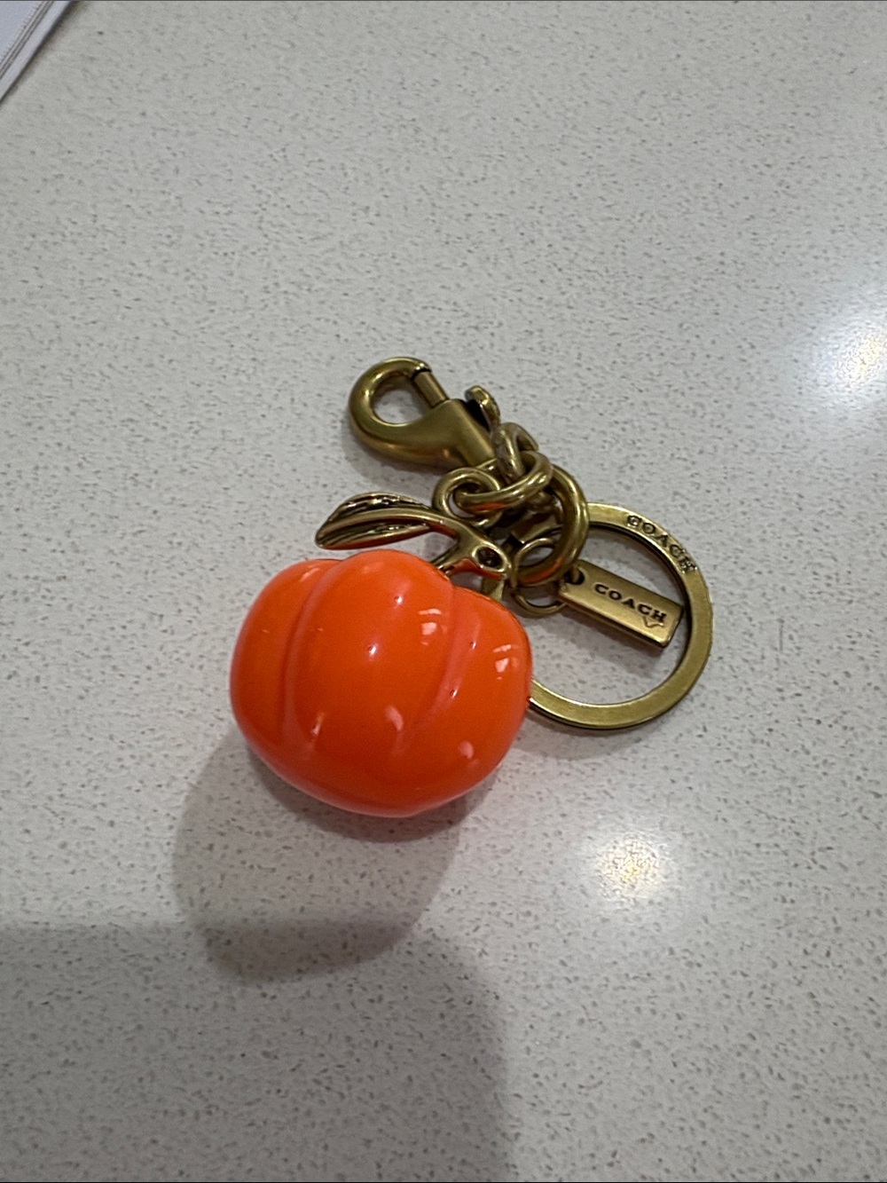 COACH Orange Pumpkin Charm Key Ring with Gold Hardware